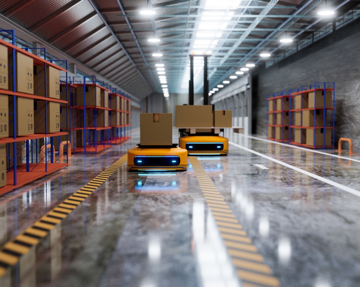 Industrie 4.0 Automatisierte Lagerroboter transportieren Kartons in einer modernen Anlage.